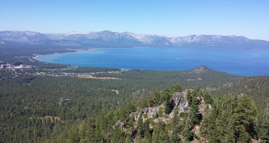 the view from the top of a mountain overlooking the ocean