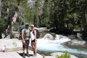backpack couple Twin bridges into Desolation wilderness