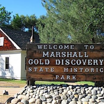 Marshall gold Discovery state Park sign and white building