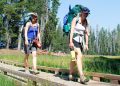 two girl backpackers summit lake