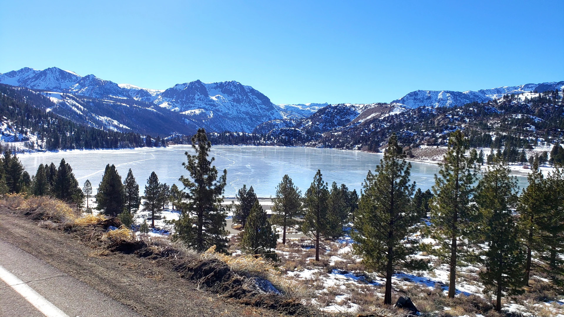 Winter Frozen June Lake mountains