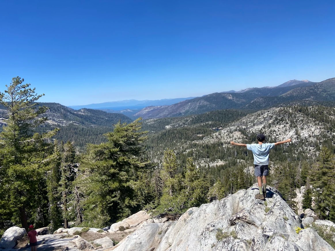 Young Boy overlooking wilderness