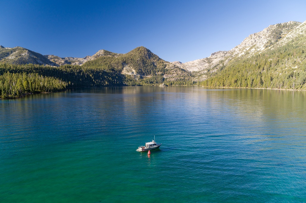 Boat on Lake Tahoe mountains