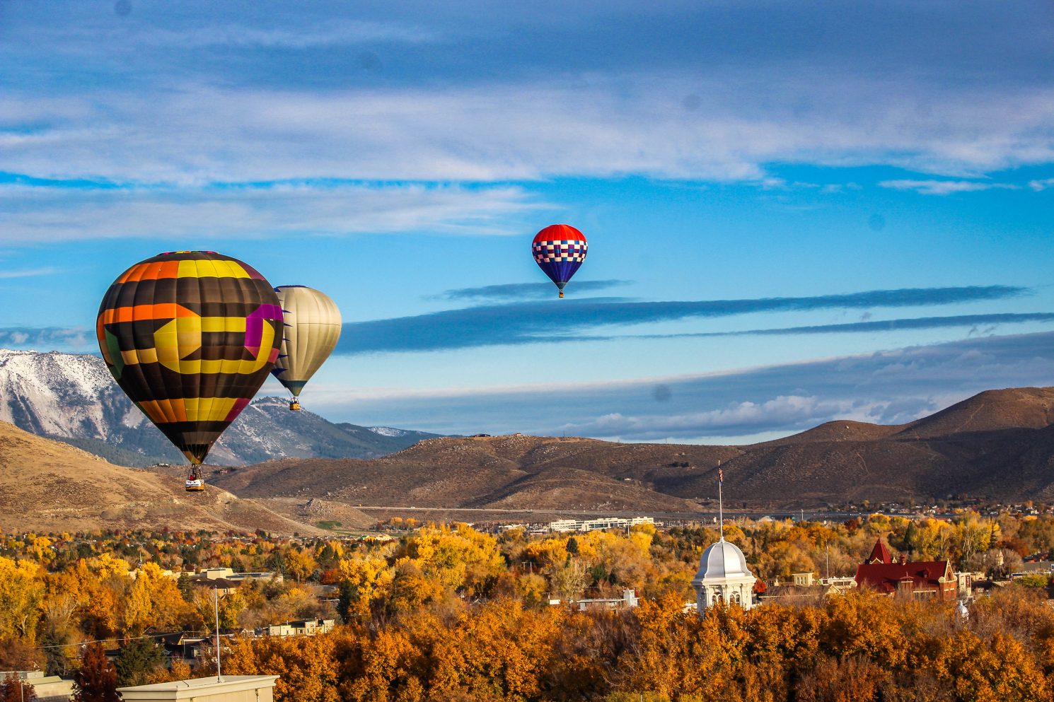 hot air balloons over fall colors in carson city