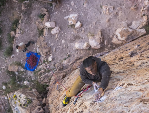 Rock climber in wool hoodie