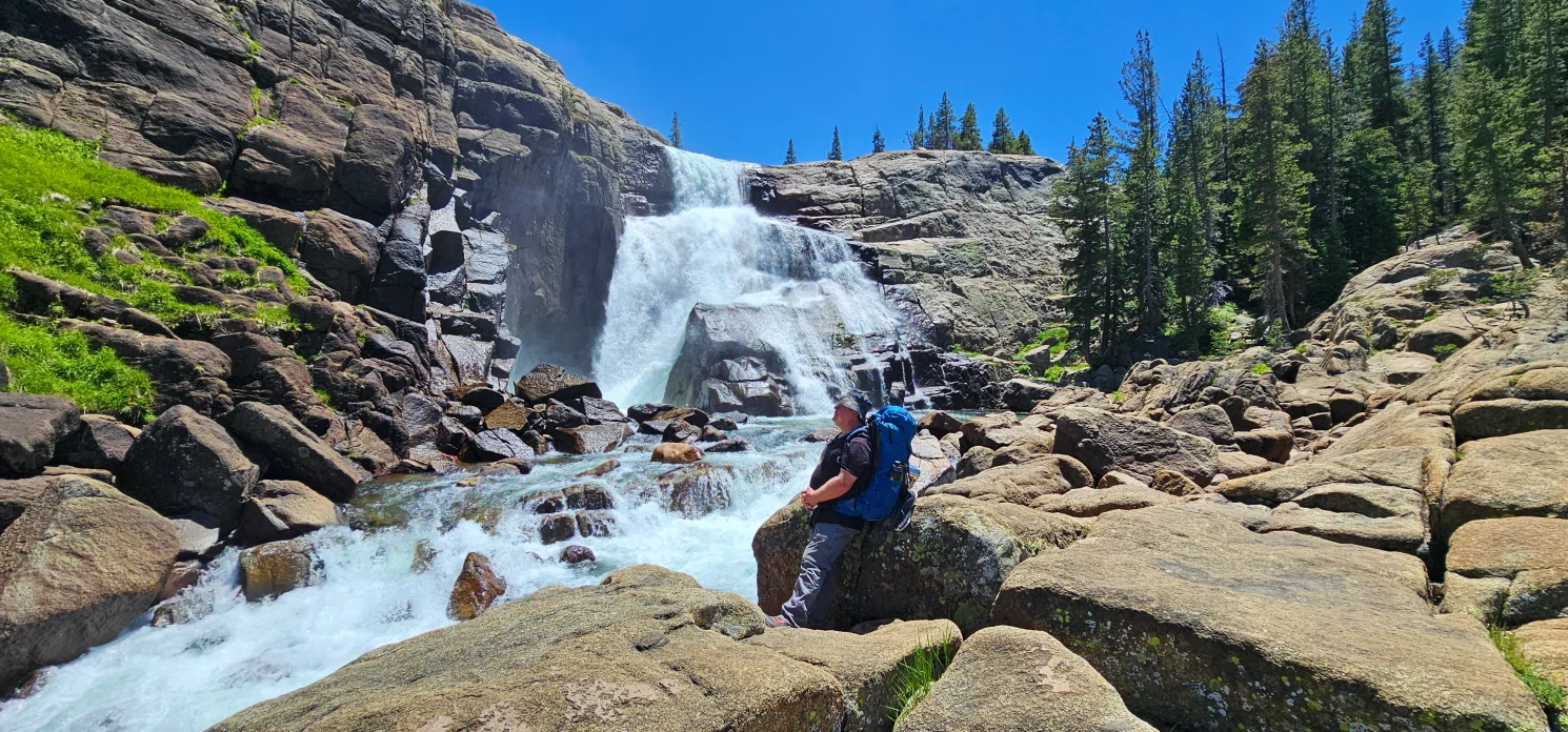 Backpacker resting near Tuolumne Falls