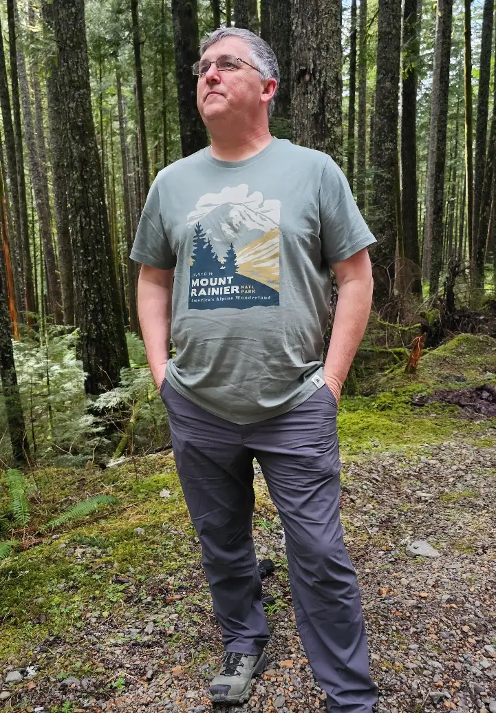 trailway pant guy standing in woods